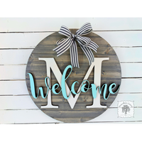 20" Round Sign Customized with Initial and Overlapping "Welcome"