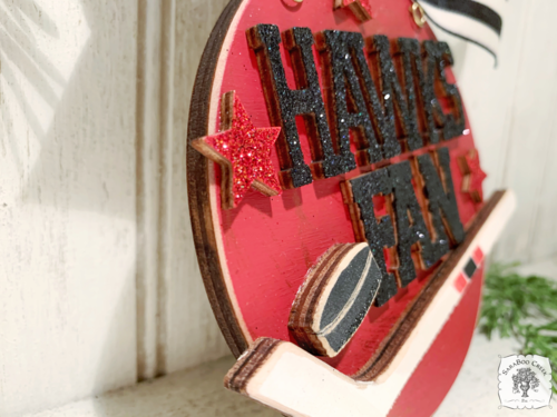 Hawks Fan Ornament with Hockey Stick & Puck