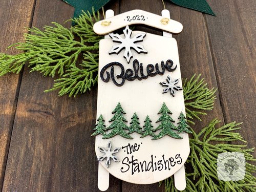 White Sled Christmas Ornament - Personalized Winter Scene with "Believe" & Pine Trees