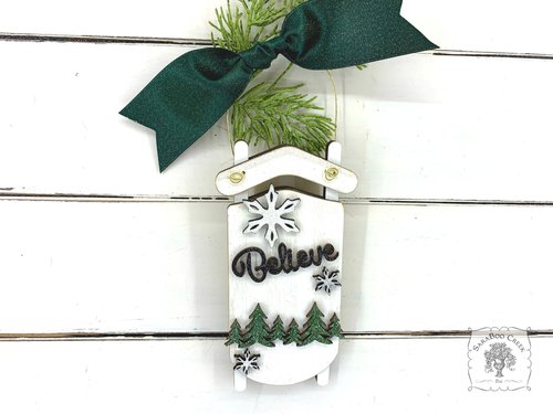 White Sled Christmas Ornament - Personalized Winter Scene with "Believe" & Pine Trees